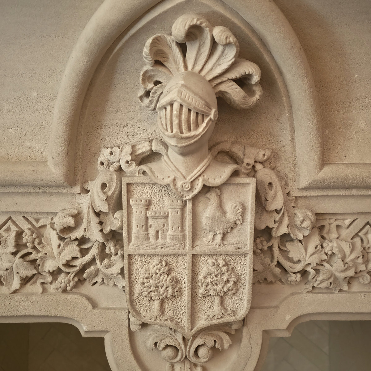 A carved stone coat of arms at Glòria de Sant Jaume