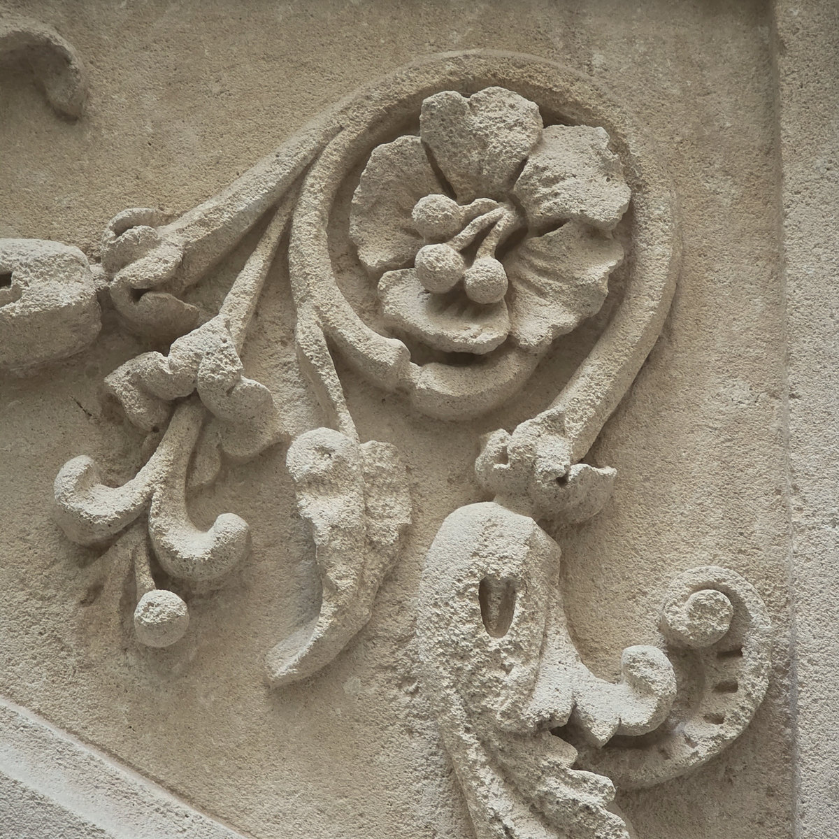 Carved stone flowers at Glòria de Sant Jaume