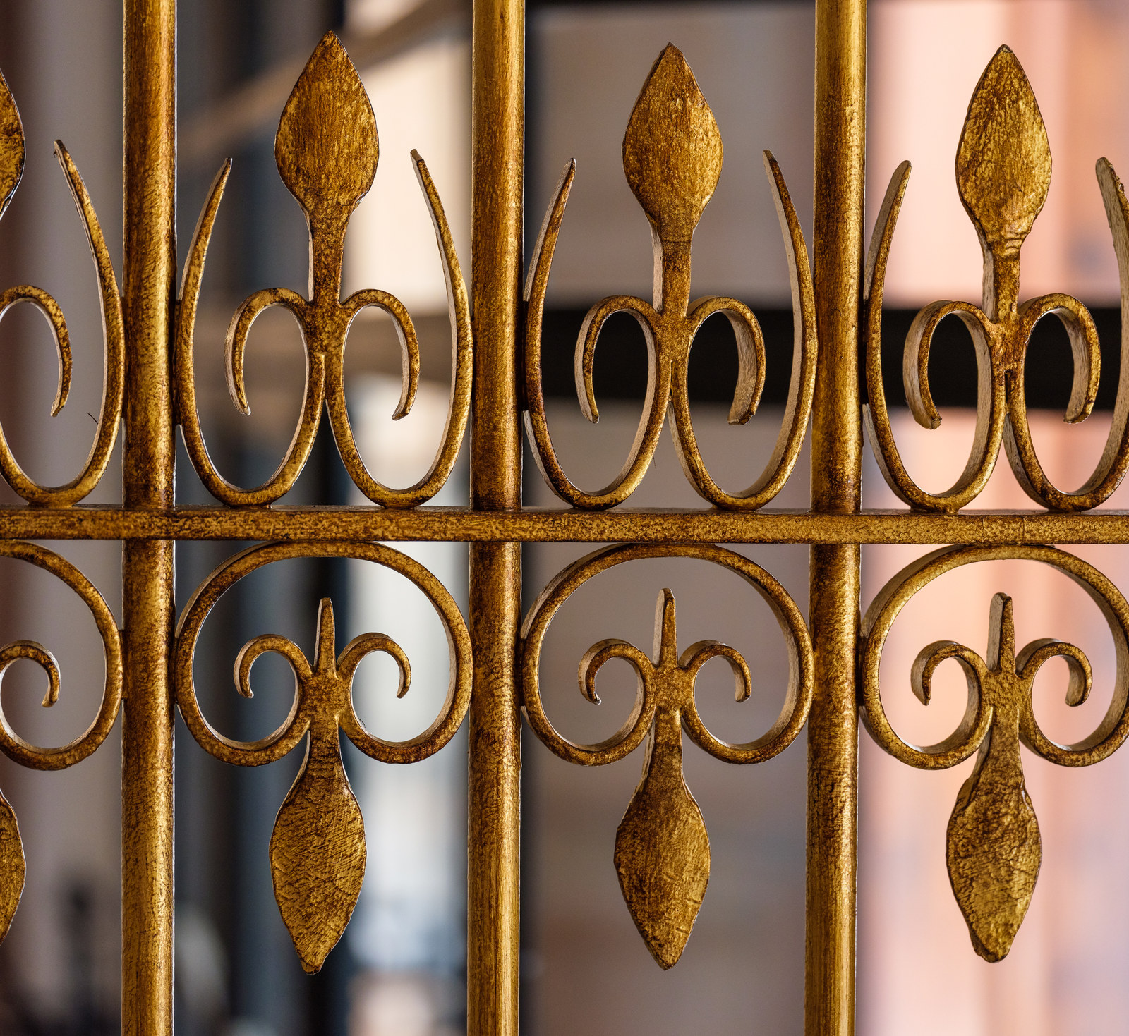 Gilded wrought-iron detail at Hotel Glòria de Sant Jaume