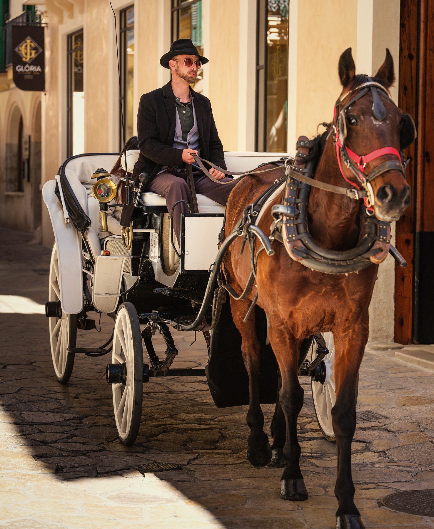A horse-drawn carriage outside Glòria de Sant Jaume in Palma old town